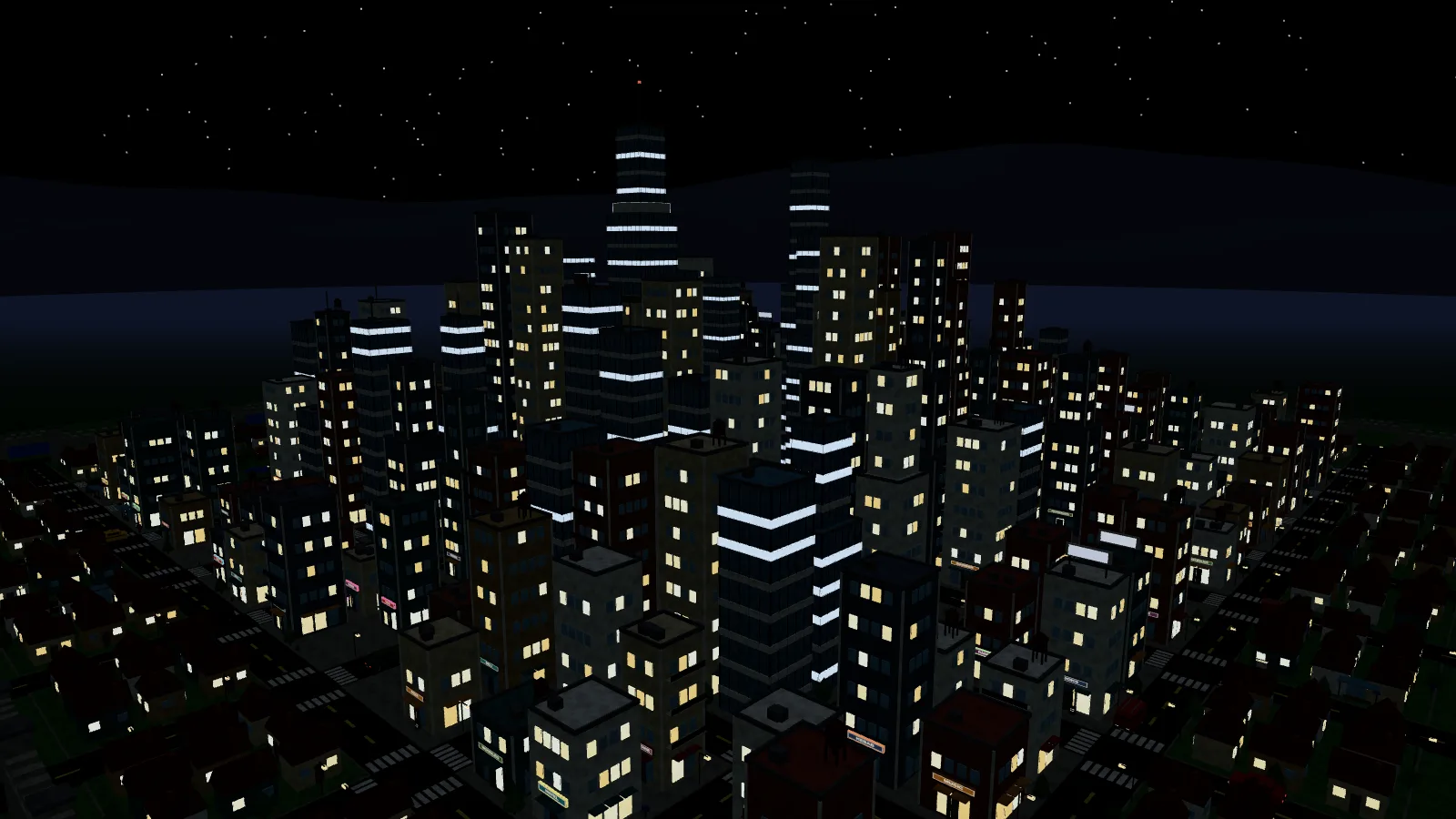 The city at night: lit windows, stars, and the ridgeline as a silhouette